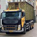 Containerwagen van Wit Siddeburen met een groene container